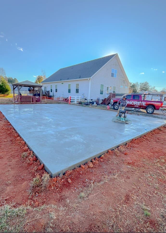 Concrete slab poured to thickness for a metal building floor