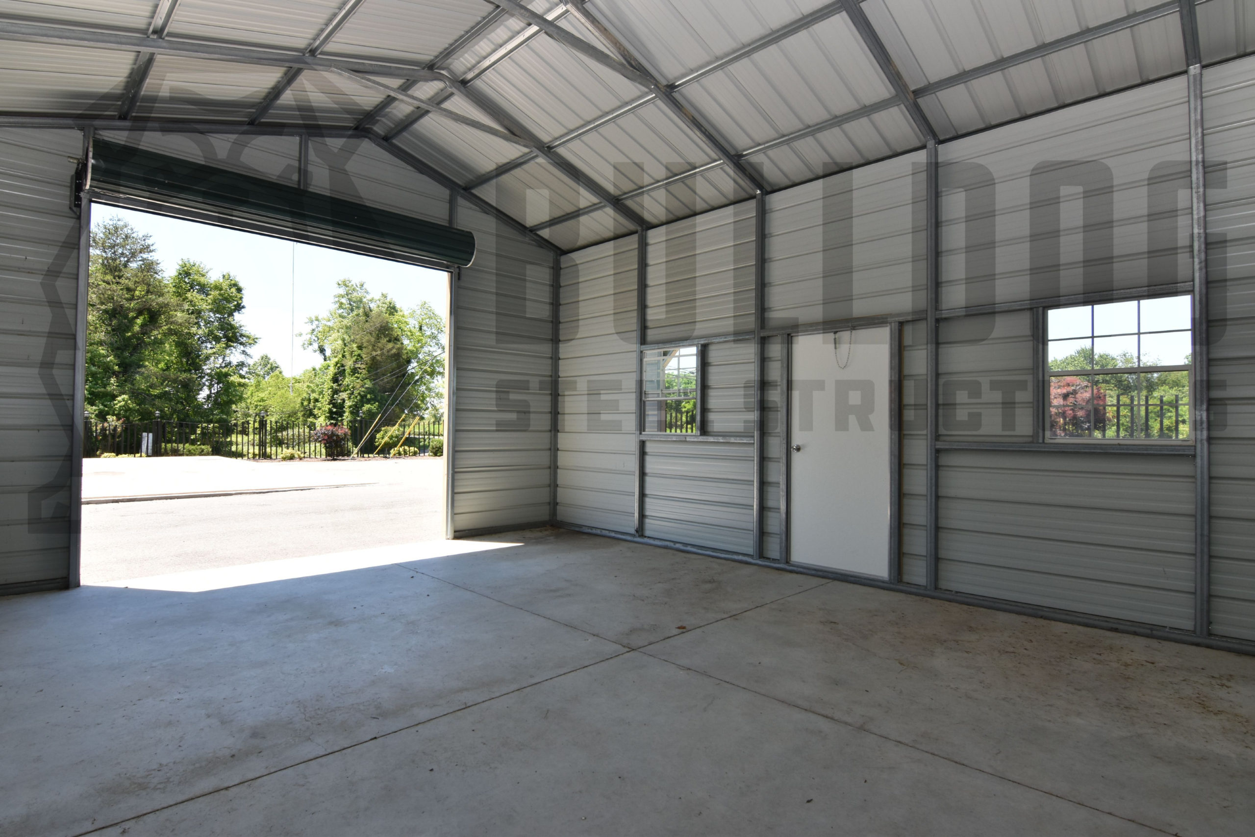 Interior of metal garage with cement floor