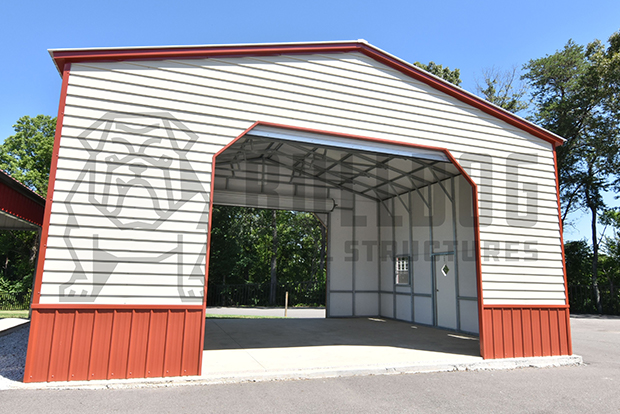Front view of red and white metal garage with Bulldog Steel Structures watermark over it.