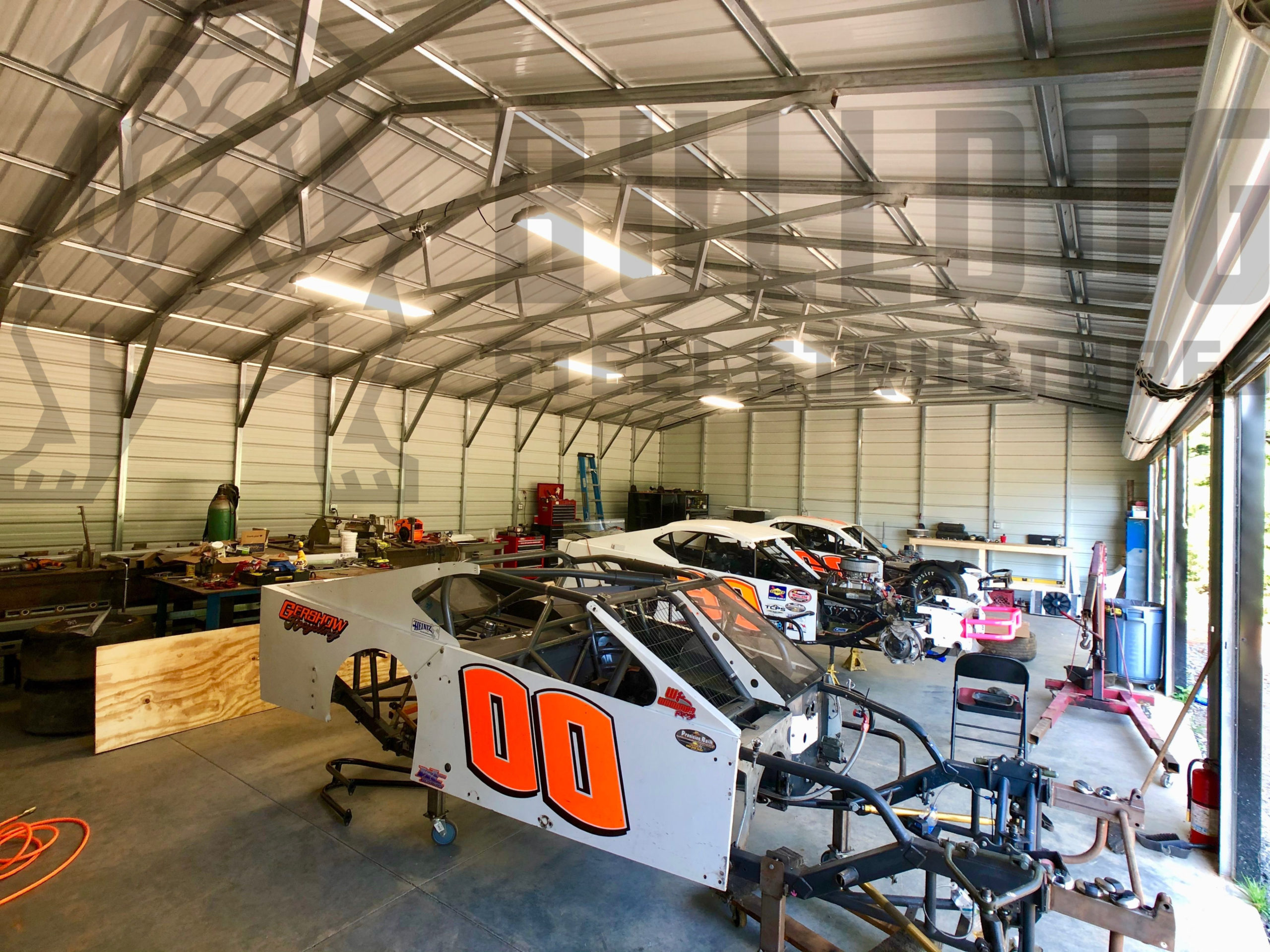 Interior of three-car metal garage