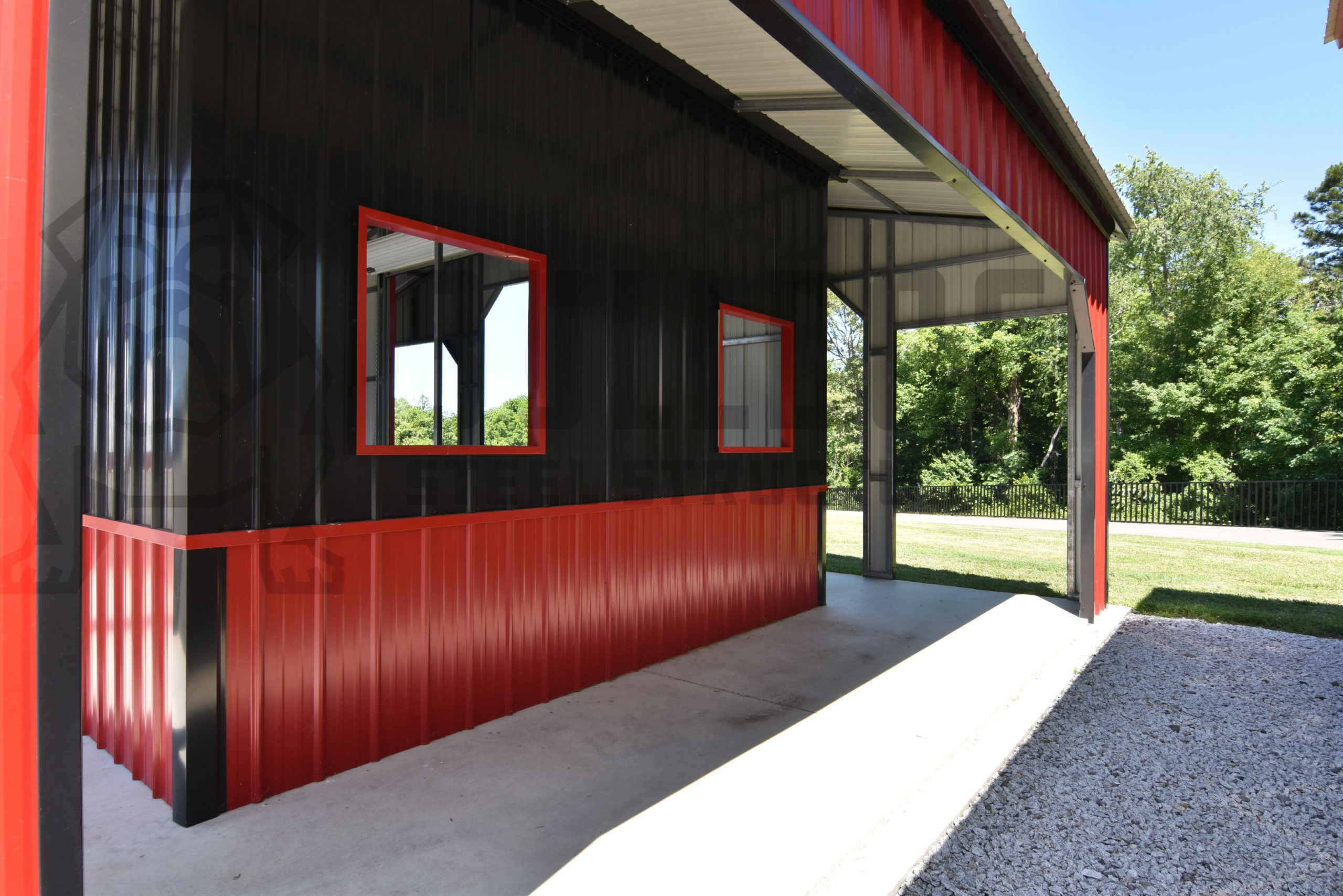 Close up of exterior of custom red barn with black trim