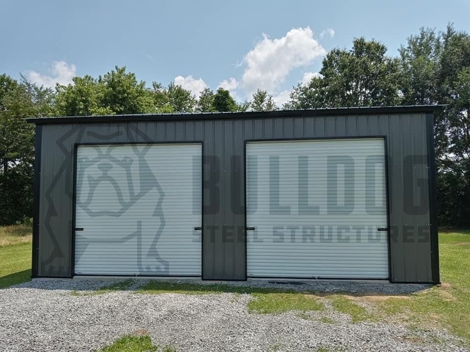 Metal garage with trees in background, and Bulldog Steel Structures watermark.