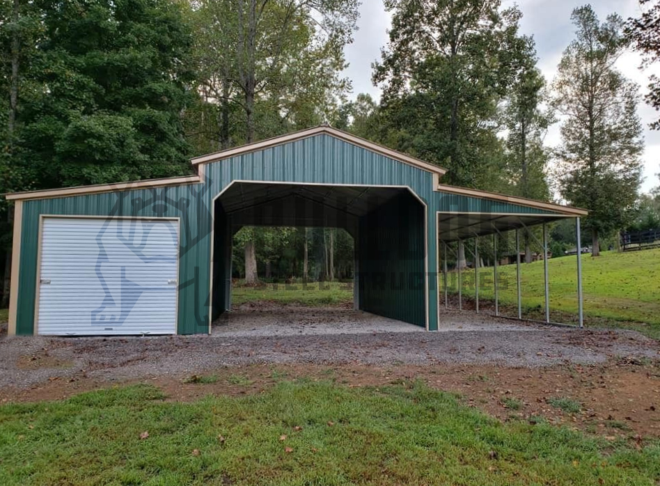 Exterior of barn with green walls and car port attached